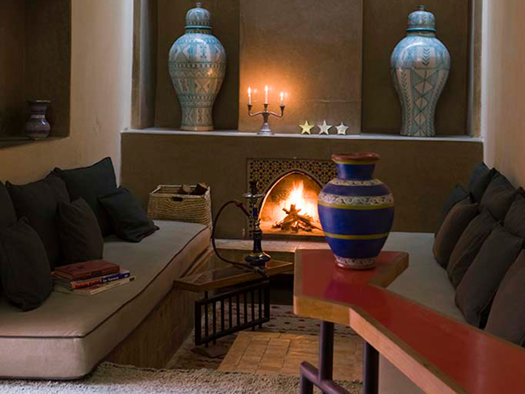 Traditional salon with fireplace. Riad DarTzt, Marrakech